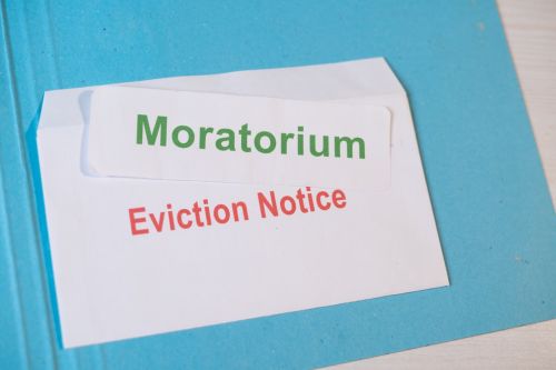 Concept showing Moratorium for evictions by showing eviction notice on table during coronavirus or covid-19 pandemic.
